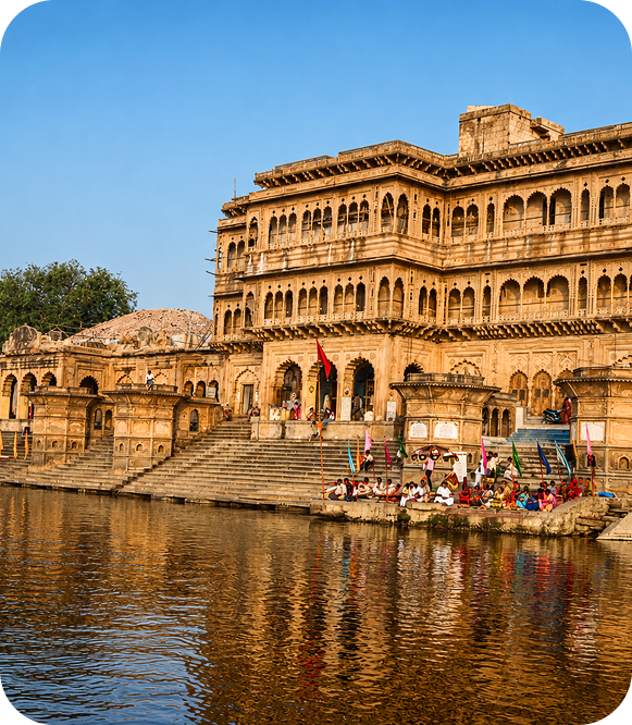 Historic ghats and grand heritage palace by sacred river